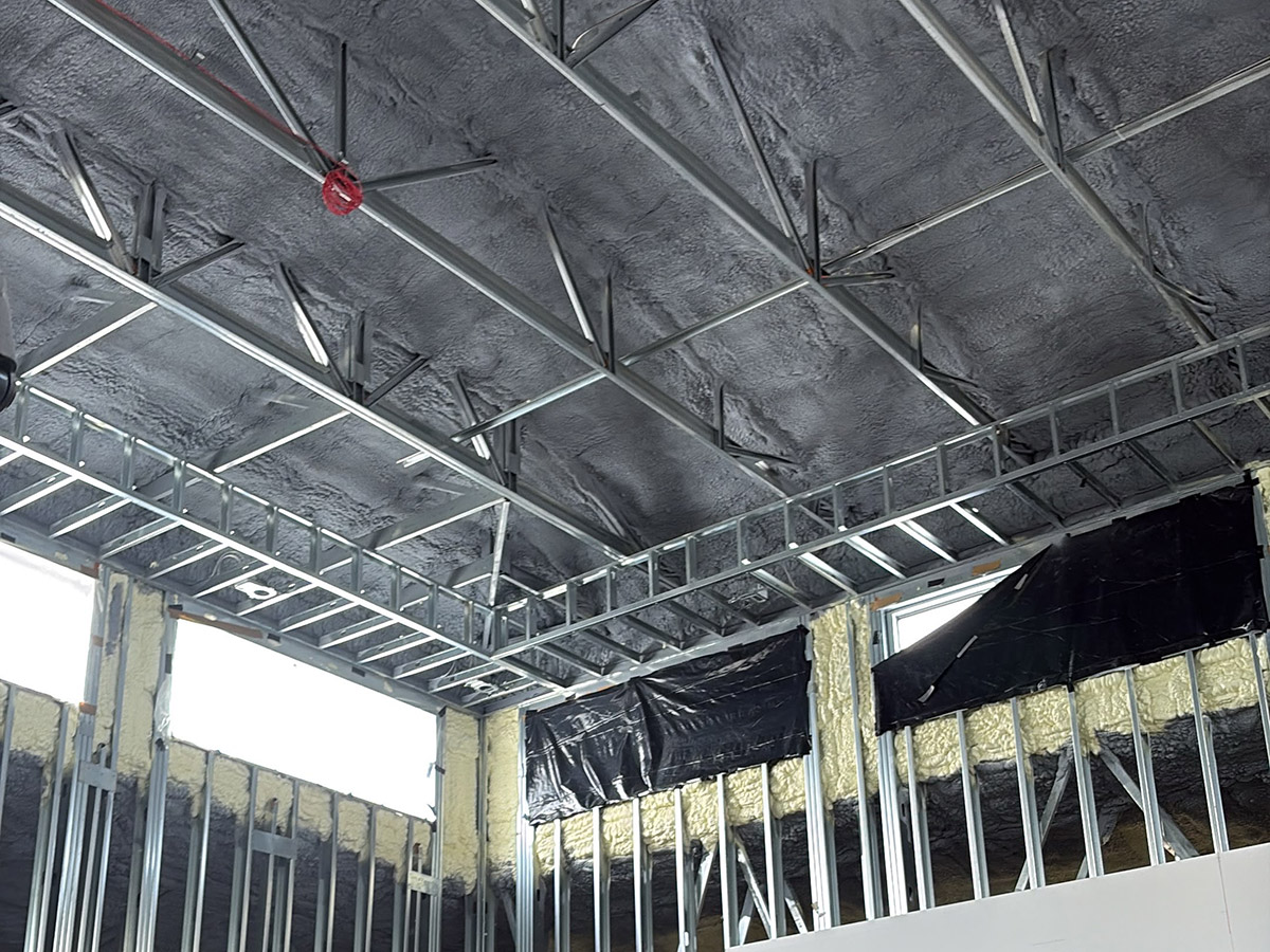Wakulla-Library-Estes-homes-and-construction-Crawfordville-FL-3 Open-cell spray foam insulation installed on the high ceiling of the Wakulla Library commercial construction project.
