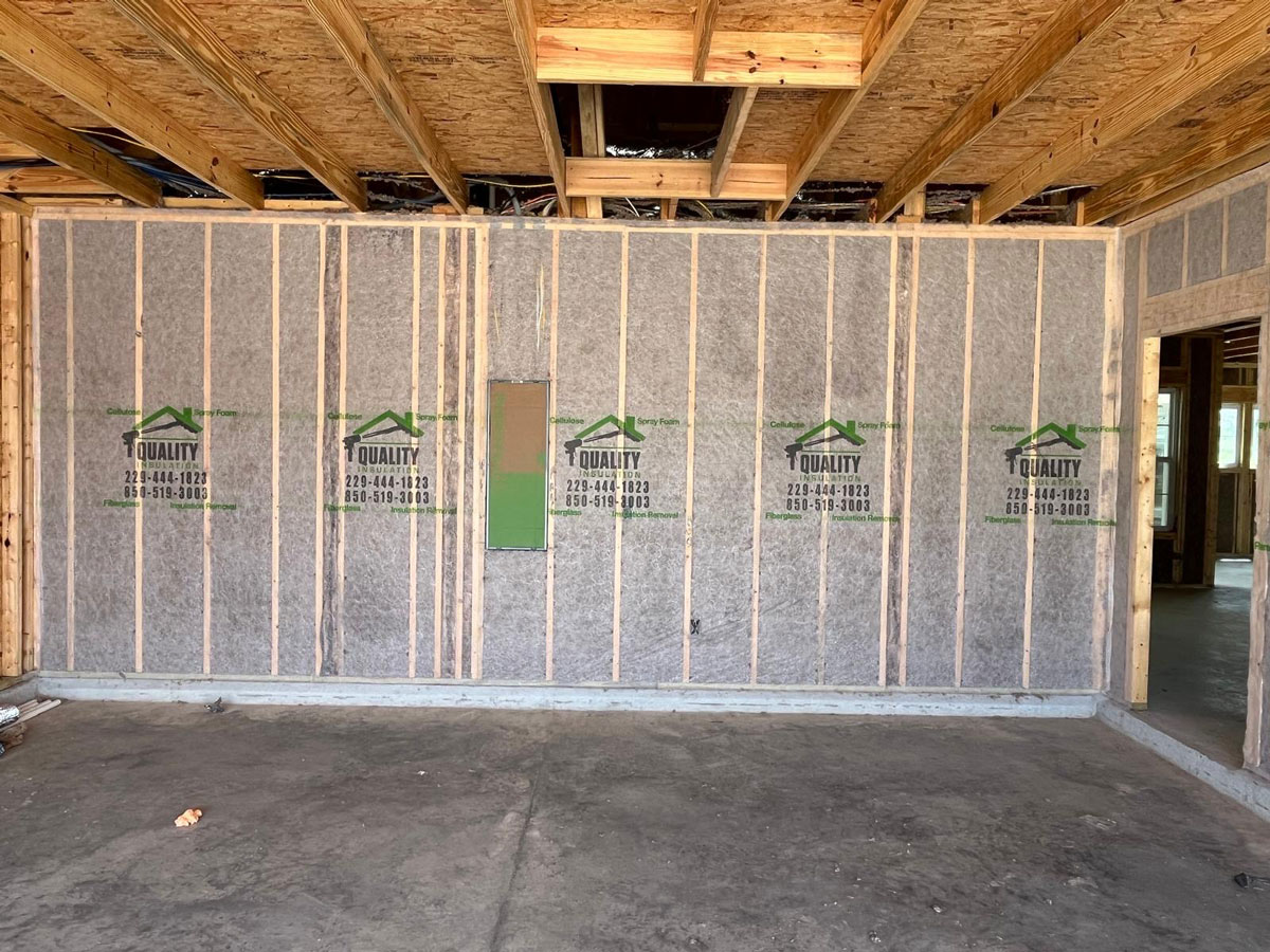 cellulose-wall-spray-2 Dense-pack cellulose insulation installed in wall cavities to improve energy efficiency, sound control, and year-round comfort.