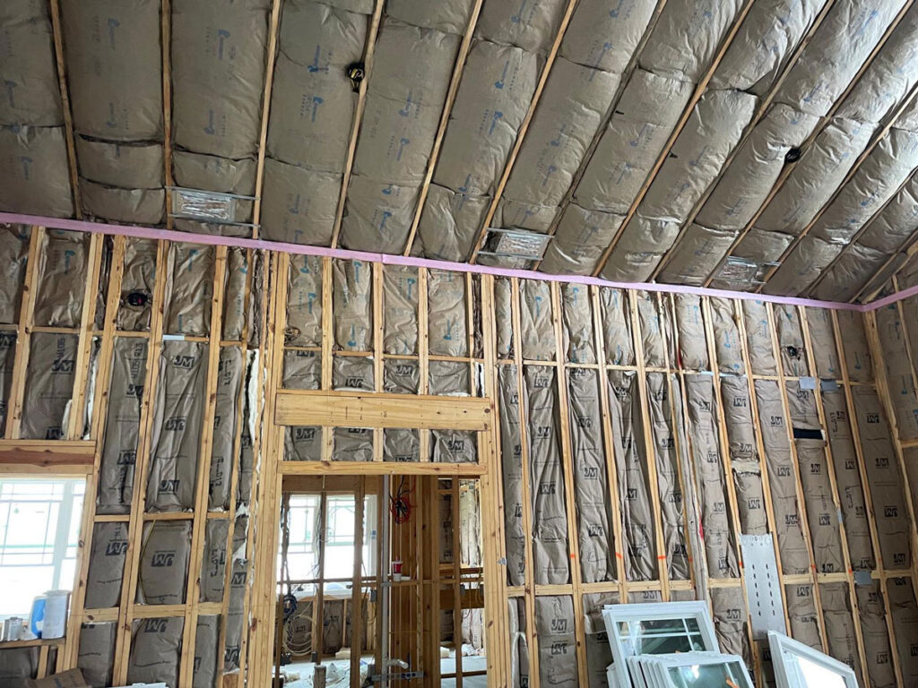 Owens Corning Rim Seal air sealing strip installed at the top plate to reduce air leakage and improve energy efficiency