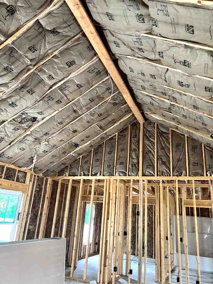 Quality Insulation of Valdosta installed kraft-faced fiberglass batts in a vaulted ceiling and gable wall of a new home in Hahira, GA.