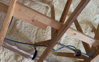 Quality Insulation of Valdosta sprayed R-21 open-cell foam on the underside of the roof deck.