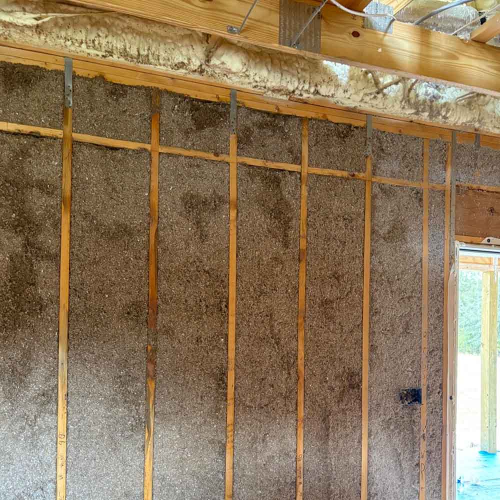 Quality Insulation of Valdosta sprayed R-19 cellulose into exterior wall cavities and R-21 open-cell spray foam in the attic above in Pinetta, FL.